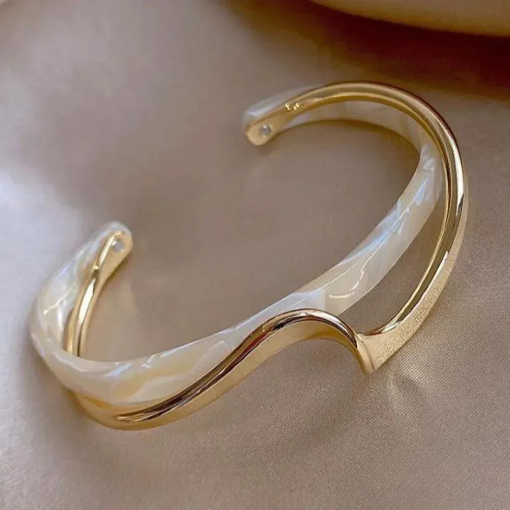 Elegant Golden Bracelet with White Opal - Sarah and Emma Portland