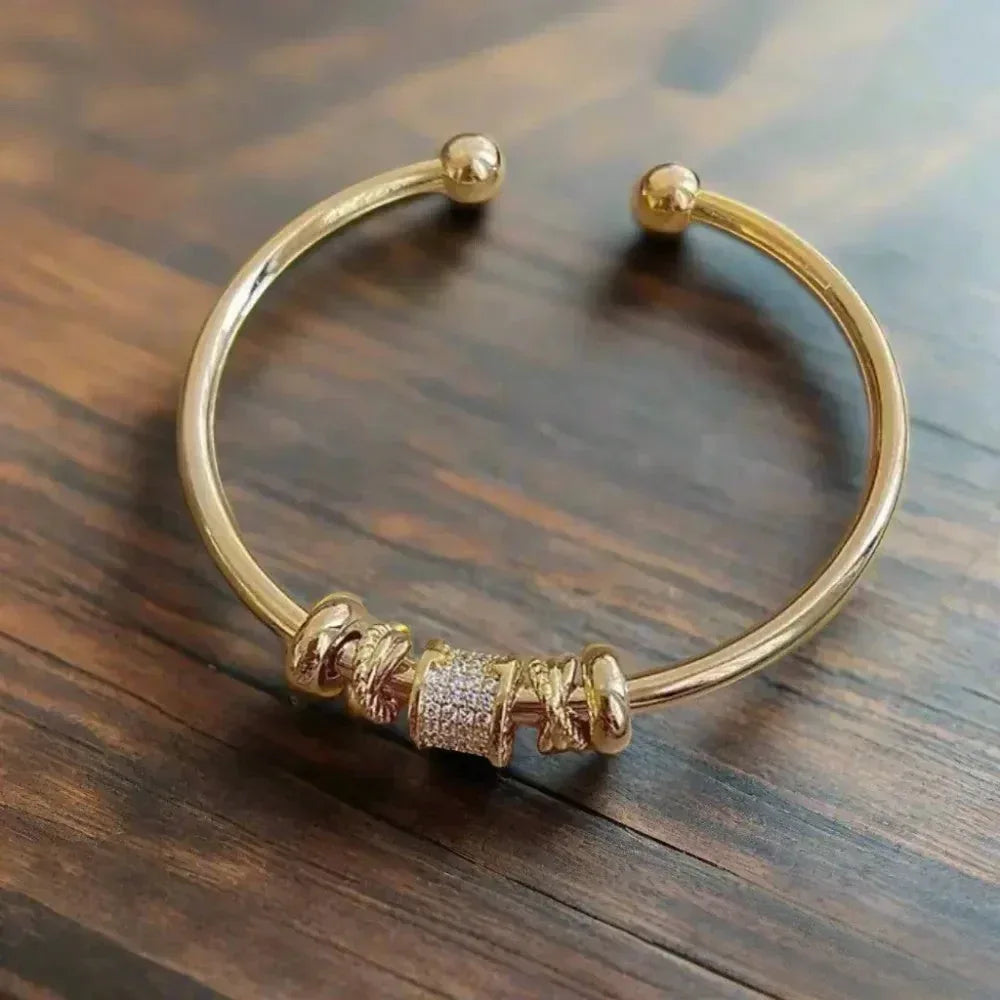 Adjustable Bracelet with Gold Charms - Sarah and Emma Portland